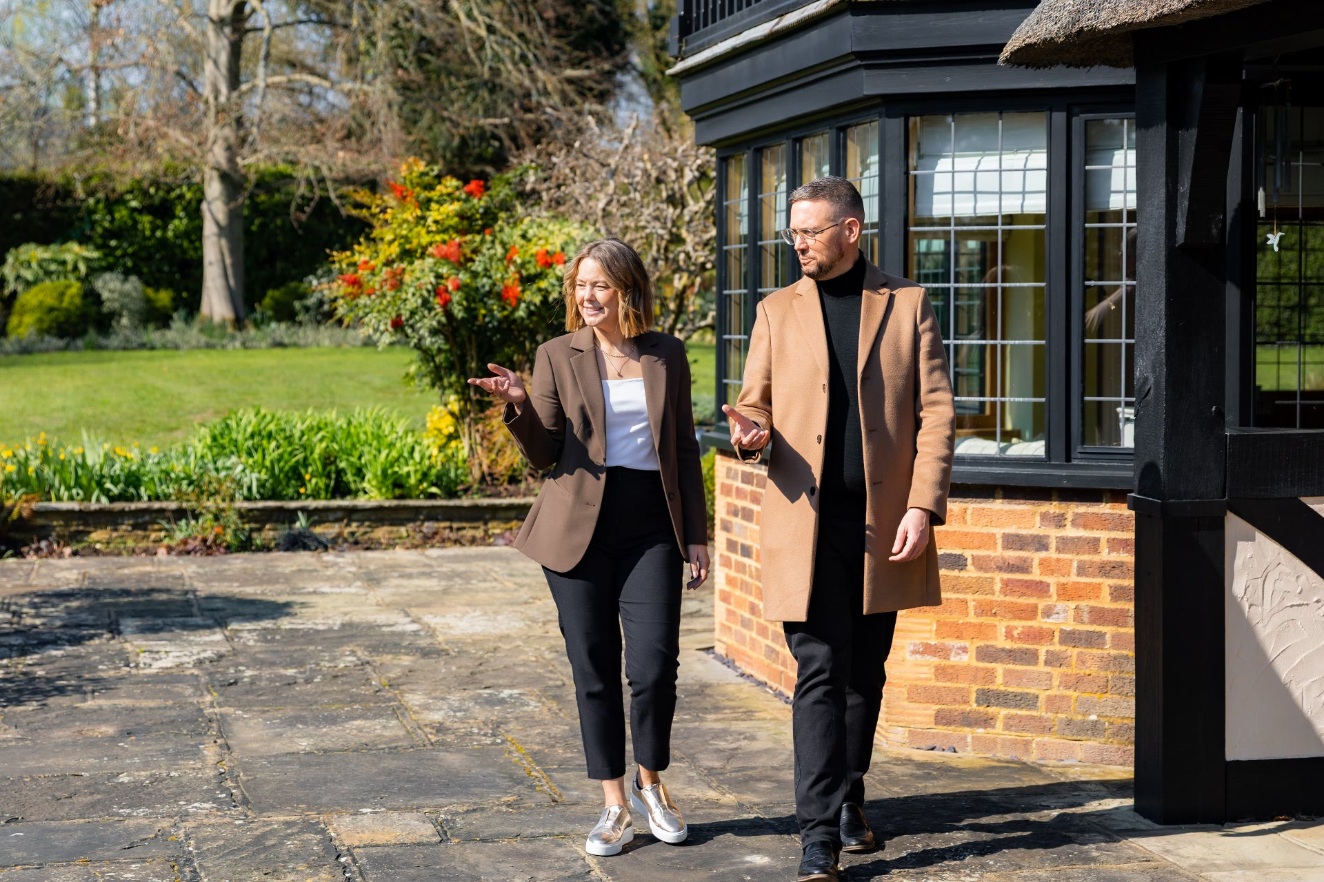 James Kendall & Co team members presenting a property to prospective buyers